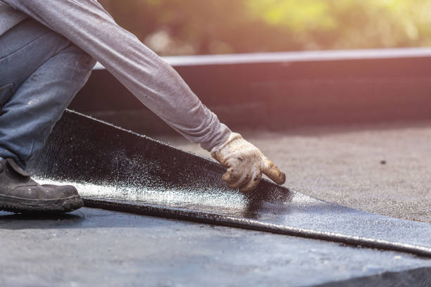 Professional Emergency Waterproofing technician working in Arlington, WI